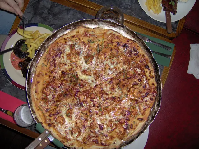 Robotic device crafts pizzas, empowering individuals with disabilities to exercise self-reliance...