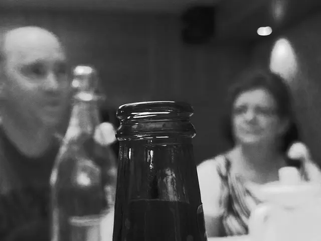 This is a black and white picture. Here we can see a women and a man and it's very blurry. In this...