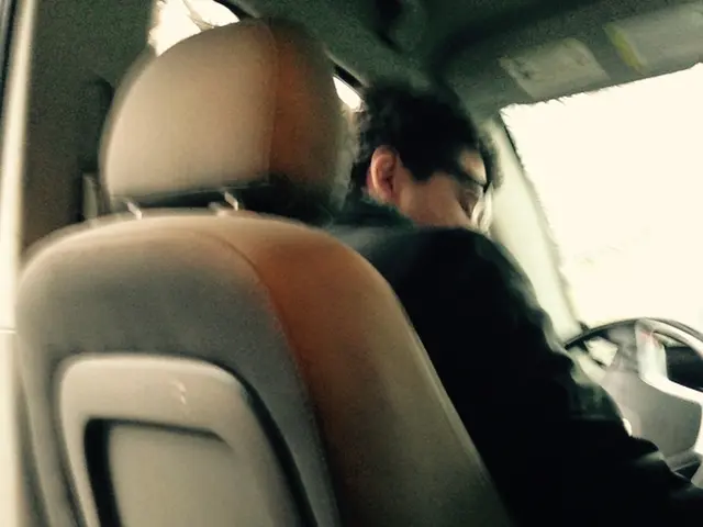 This Picture describe about the in side view of a car in which a person is sitting in the driving...